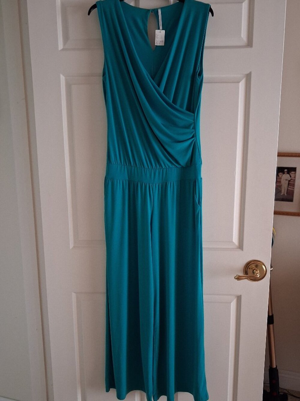 New Cross-Front Aqua Jumpsuit with Flared Leg in elegant soft-stretch fabric